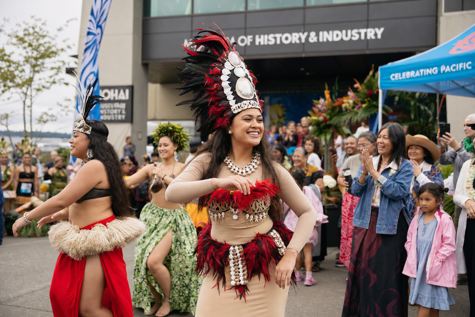 Pacific Islander cultural dancers in traditional costume performing at a community celebration